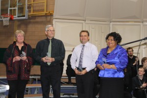 Kathy Bergen (from left), Lorlie Barkman, John Neufeld, and Odette Mukole received the 2014 Blazer Distinguished Alumni Awards, which annually recognize alumni who, through their lives, embody CMU’s values and mission of service, leadership, and reconciliation in church and society.