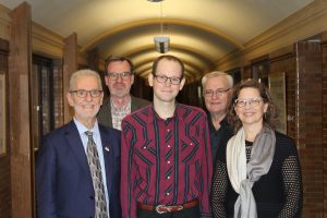 CMU donor Ted Fransen stands with Joshua Nightingale and CMU represenatives.