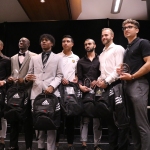 Aquino (far right) accepts his All-Canadian Award at the 2022 CCAA Men's Soccer Nationals