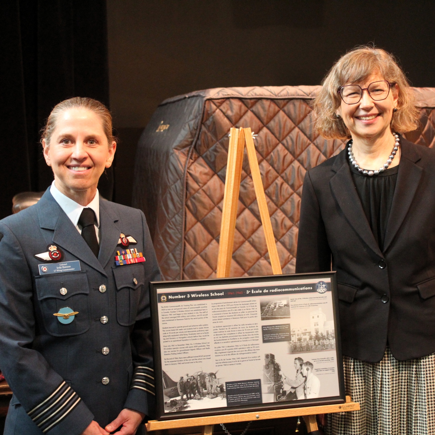 Commander Colonel Jody Hansen of Royal Canadian Air Force 17 Wing with CMU President Cheryl Pauls at the RCAF unveiling of a plaque commemorating the heritage building at 500 Shaftesbury Blvd.