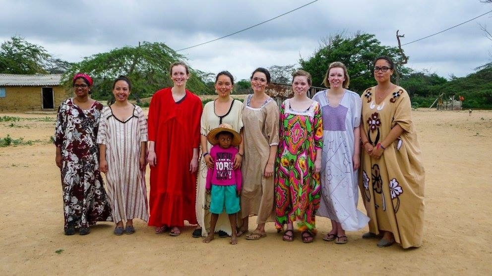 Some of the students pose in traditional dress in the Wayuu community. Walaliyadde is at the far left; Ardila is in the middle with the child. Some of the students pose in traditional dress in the Wayuu community. Walaliyadde is at the far left; Ardila is in the middle with the child.