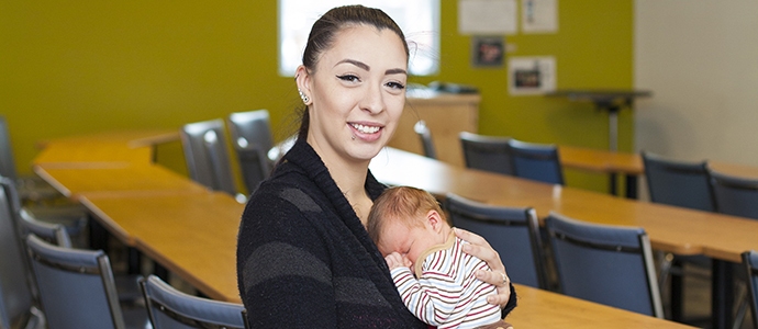Jaimie Sanderson with two-week old River. Jaimie Sanderson with two-week old River.
