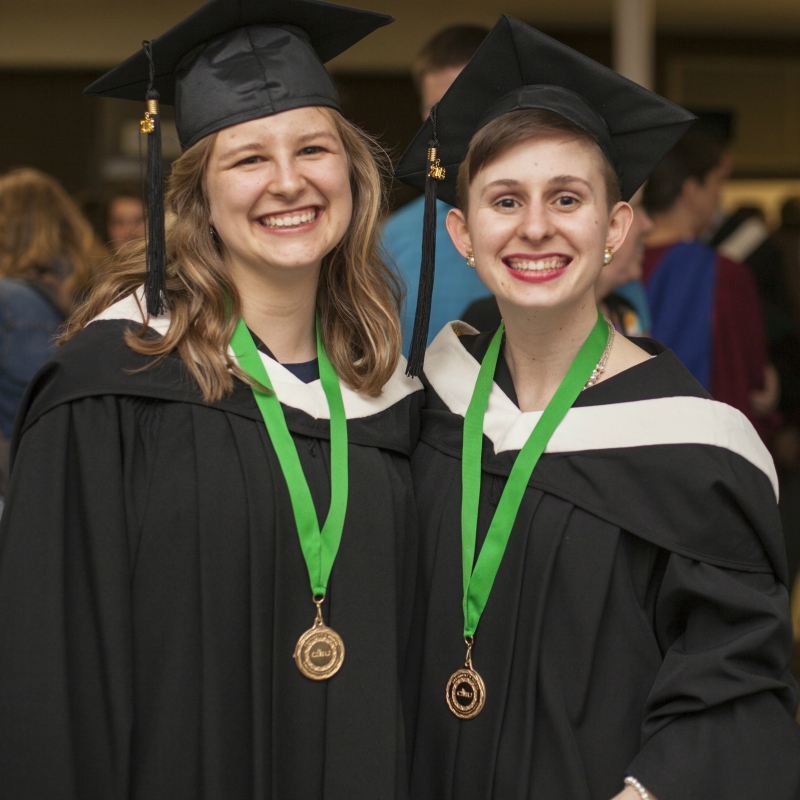 CMU's 2018 President's Medals were awarded on April 21 to Laura Carr-Pries (left) and April Klassen on the merits of scholarship, leadership, and service.