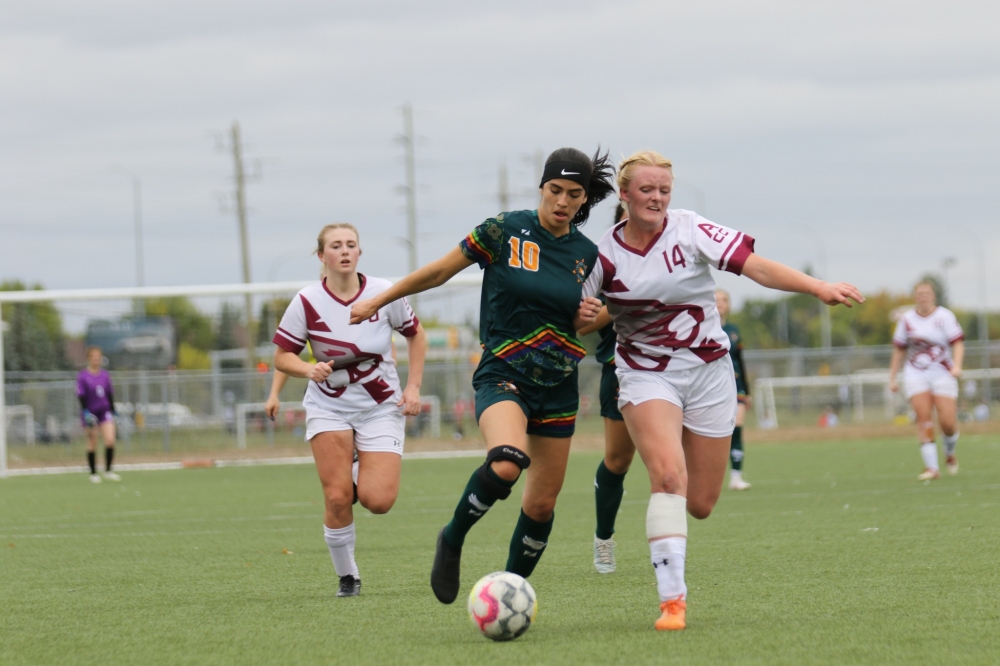 Louisa Morton leads the counter-attack in the Blazers' win over the Assiniboine Cougars earlier this September.