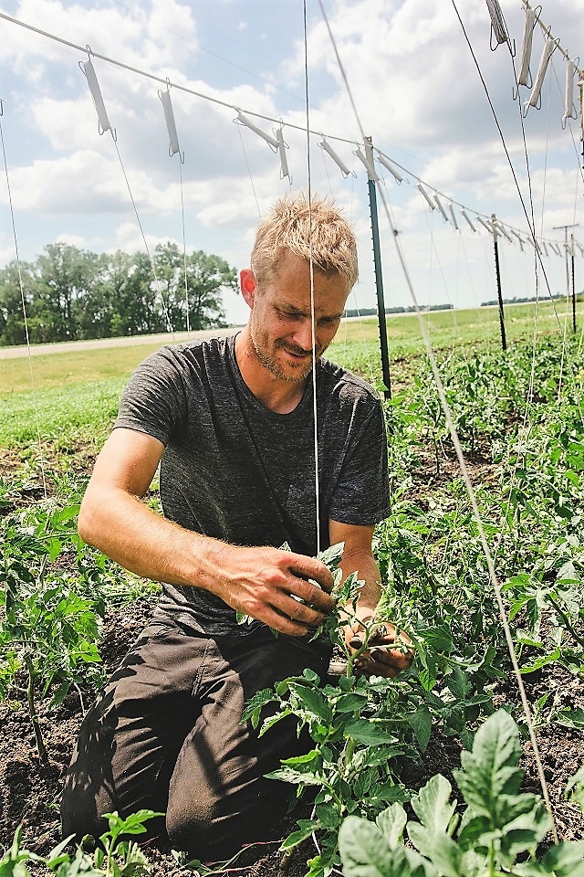 Nicholas Rempel at work on the farm