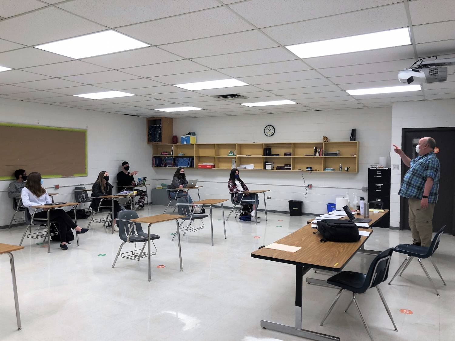 MBCI teach Raymon Rempel (far right) has engaged his students in a critical review of the MB Confession of Faith with the help of Dr. Paul Doerksen and Dr. Andrew Dyck from Canadian Mennonite University