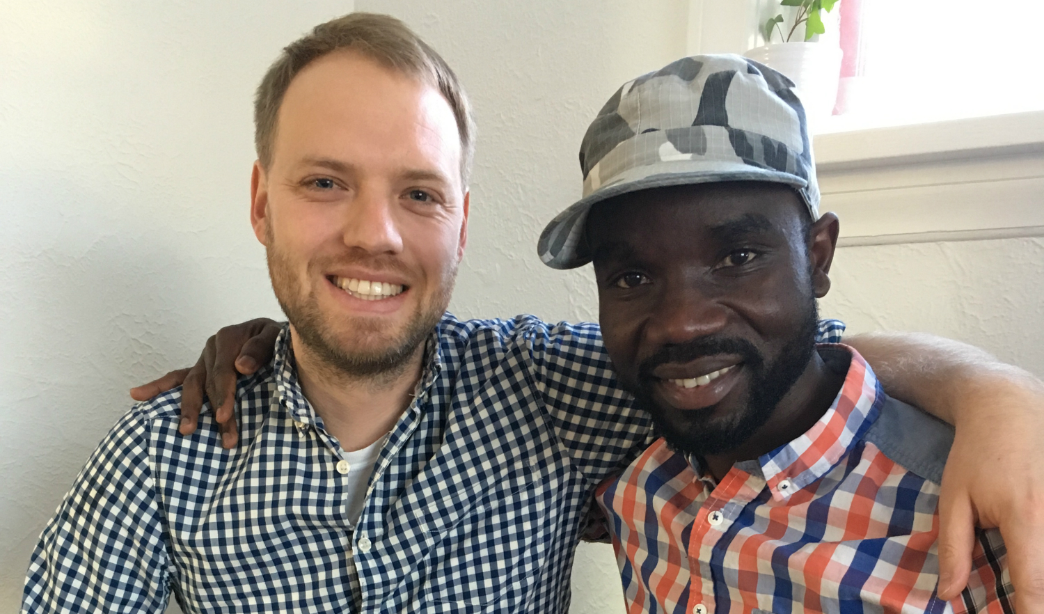 Dustin Unrau (left) and Jackson Nahayo developed a deep friendship while tree-planting in BC eight years ago.