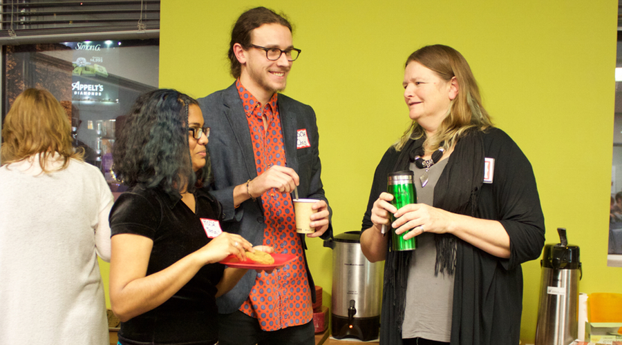Chris Sundby chats with MSCSA Sustainability Coordinator Teruni Walaliyadde (left) and Conflict Resolution Professor Karen Ridd (right) at the Common Unity event.