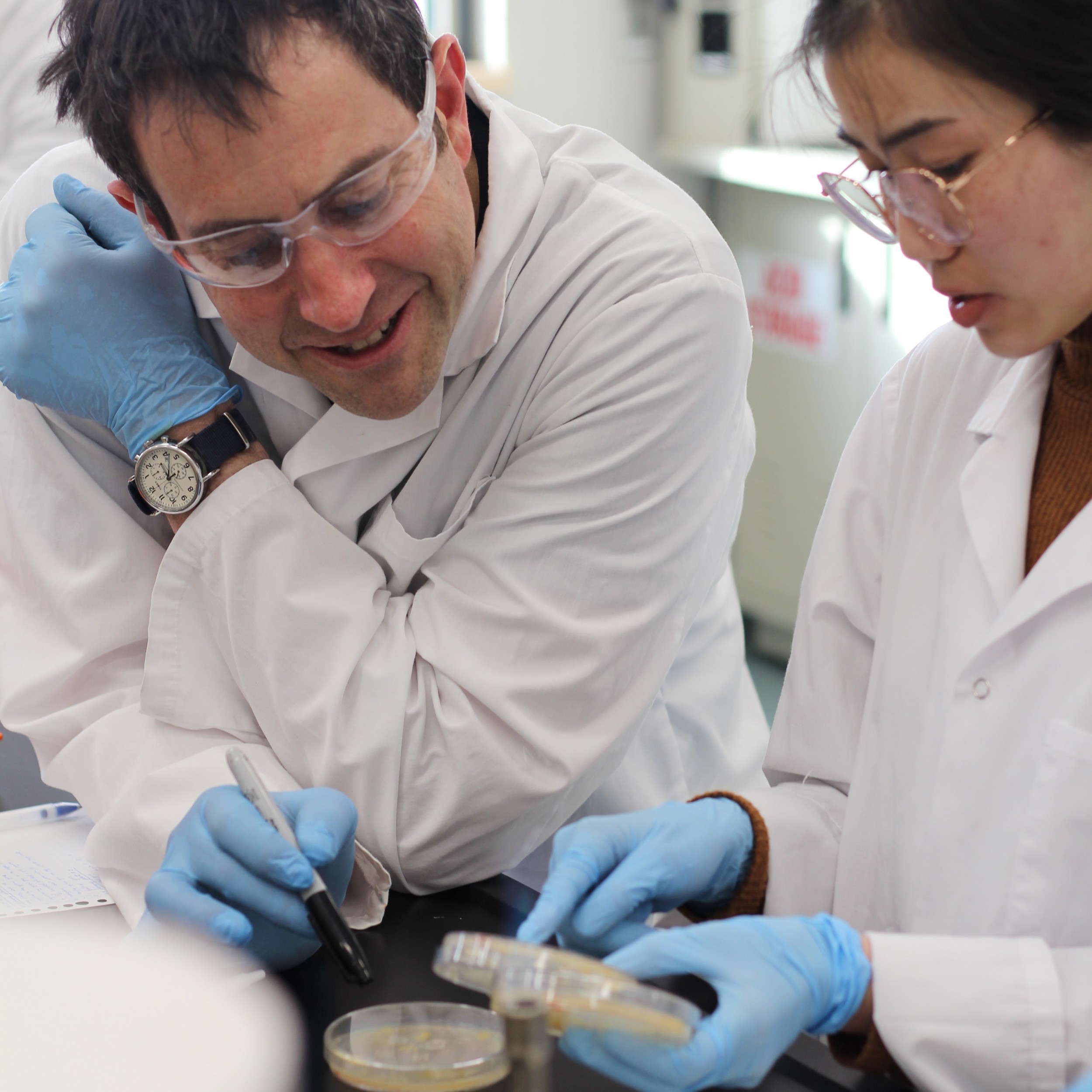 John Brubacher with student in the biology lab