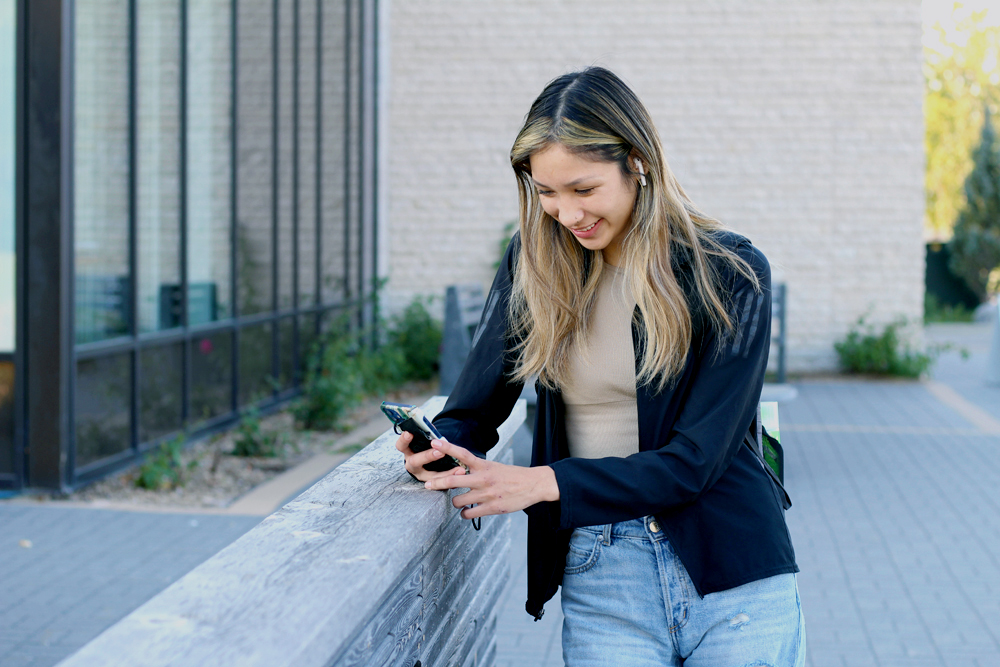 Student looking at phone