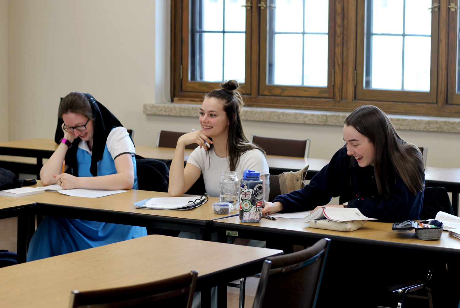 3 students attend class