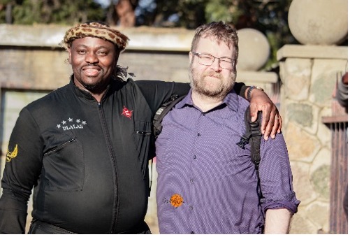 Madlela Skhobokhobo, emcee of the Bulawayo Arts Festival concert and Jonathan Sears.