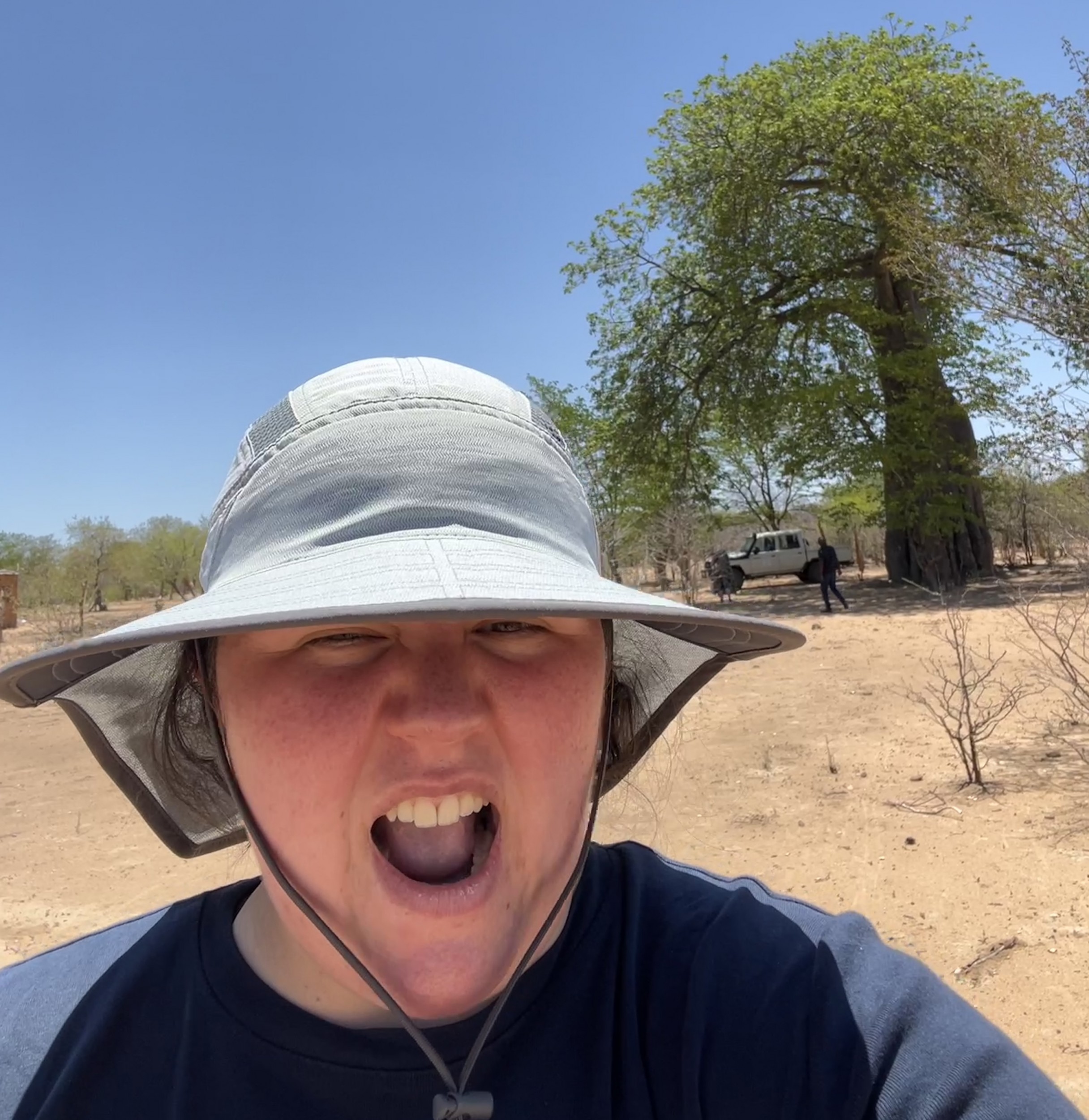 A selfie of Kara in a desert area in Zimbabwe.