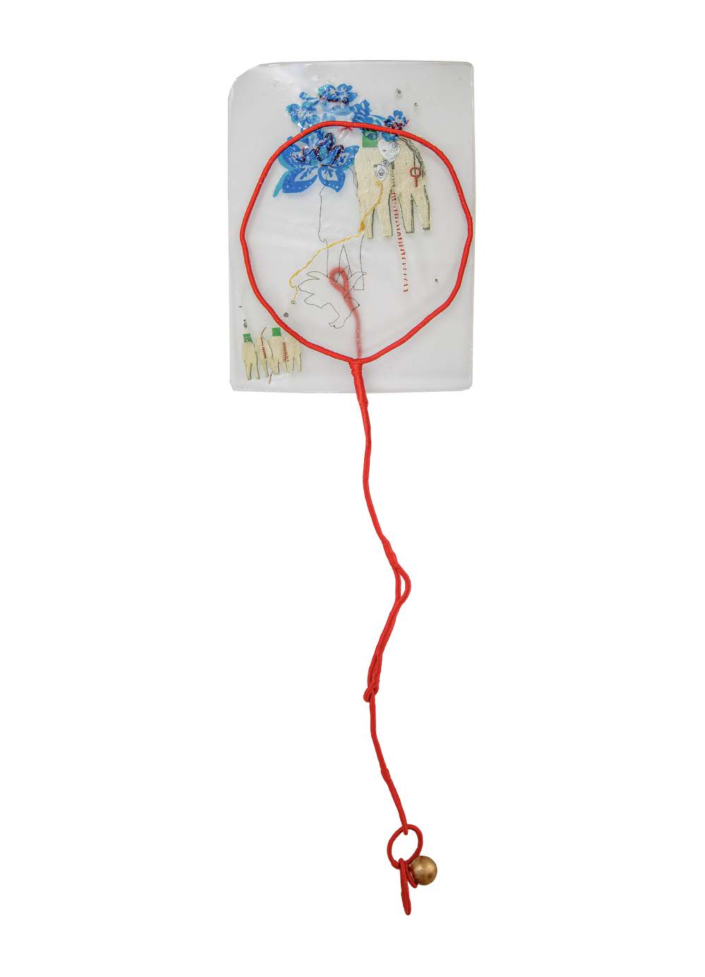 Mixed-media artwork featuring a large red cord loop over a translucent white panel decorated with blue floral motifs, stitched figures and a small gold bell.