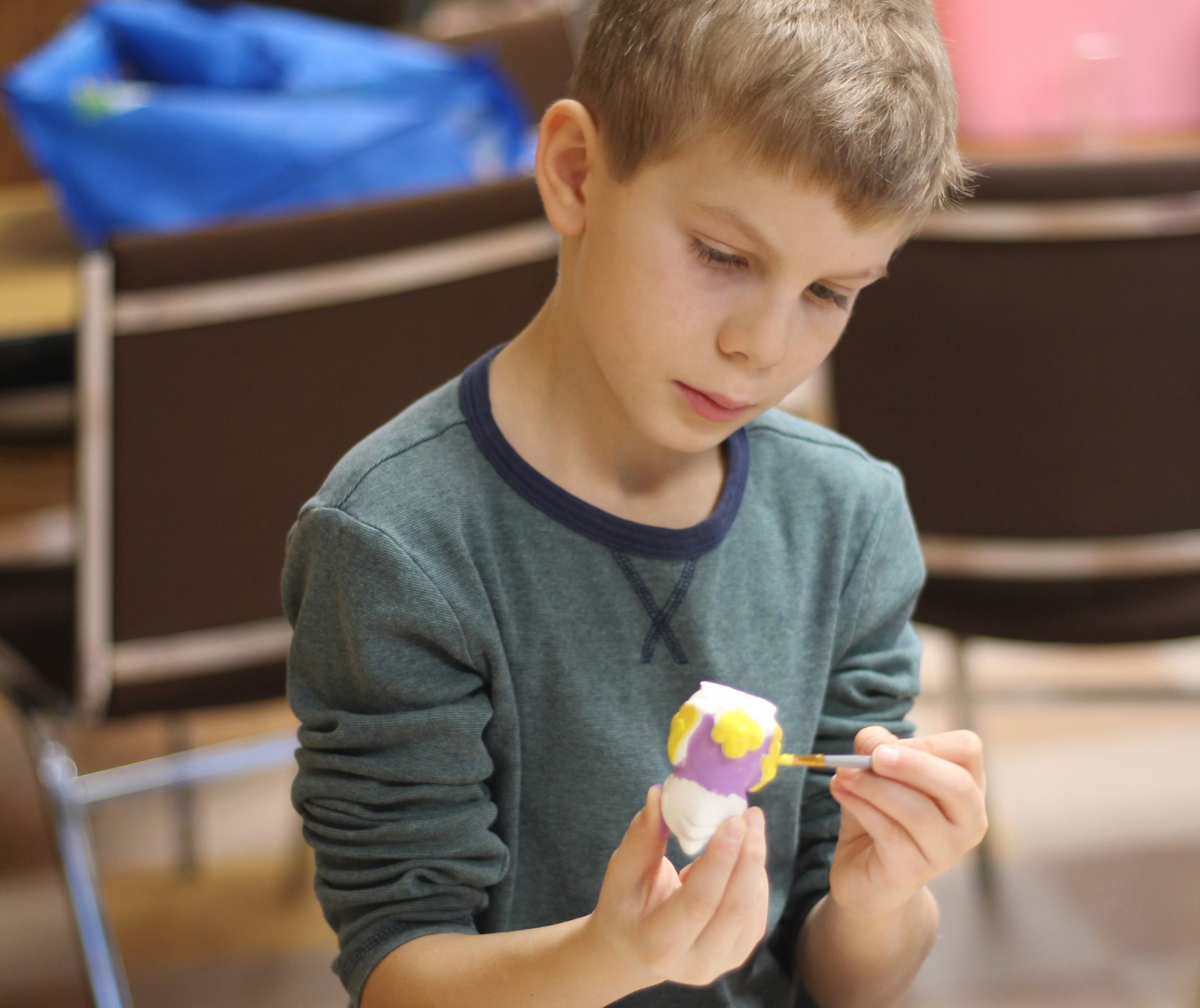 student works on craft